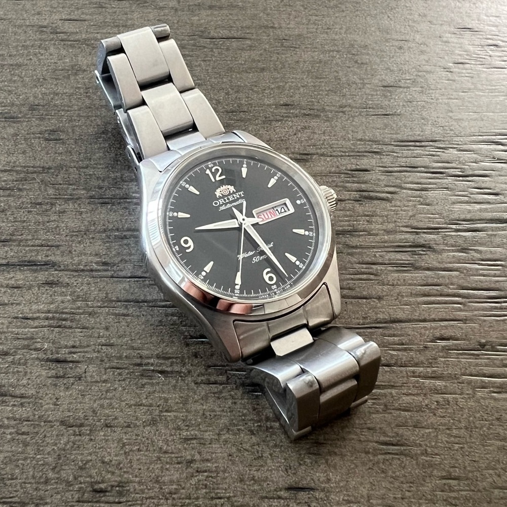 Orient women’s silver watch